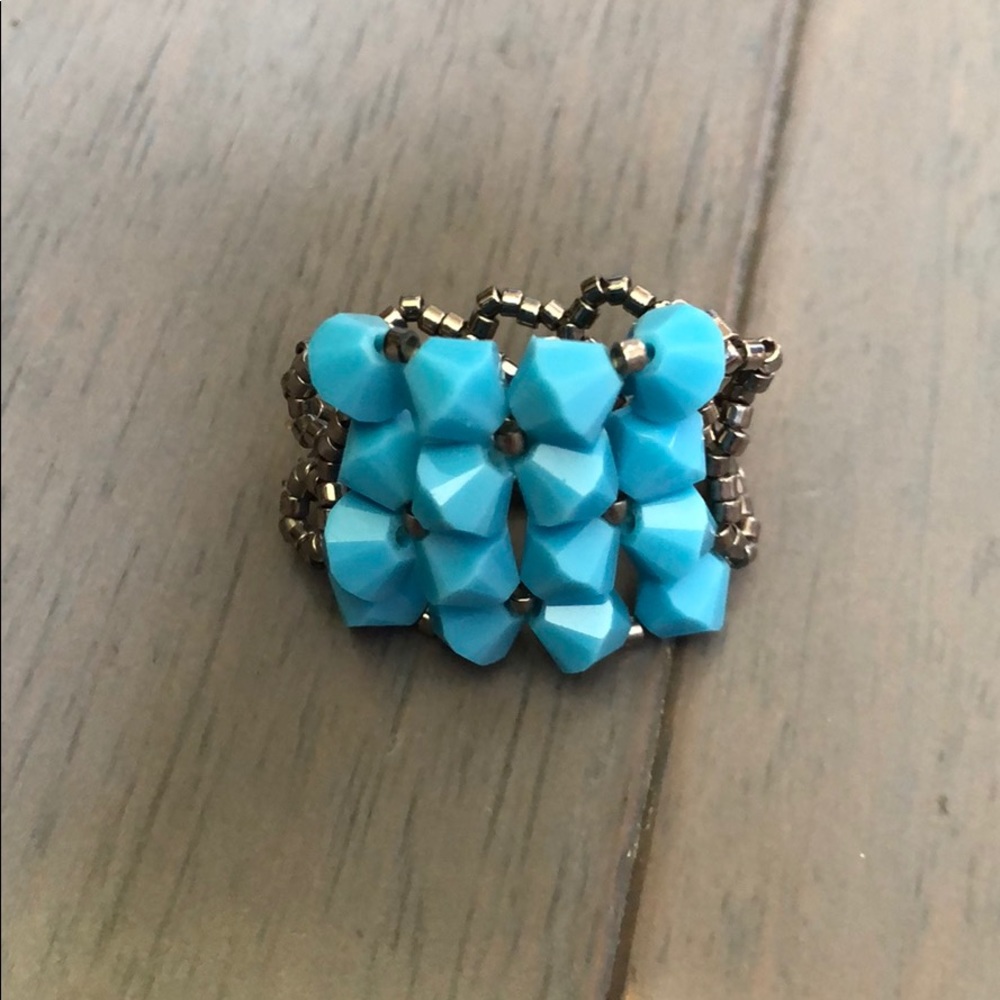 Turquoise-blue stretchy ring. Sizes 6-8.